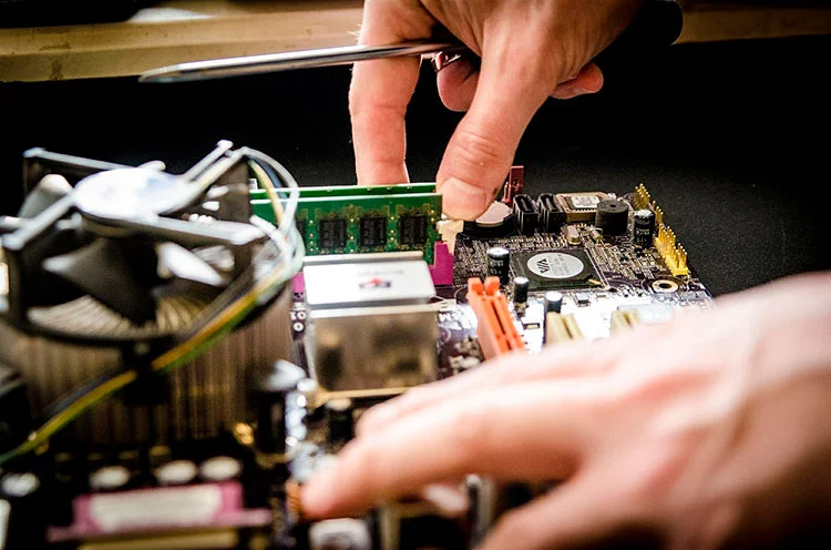 Technician repairing a computer